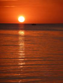 O incrível pôr-do-sol em Caye Caulker, na grande barreira de corais de Belize